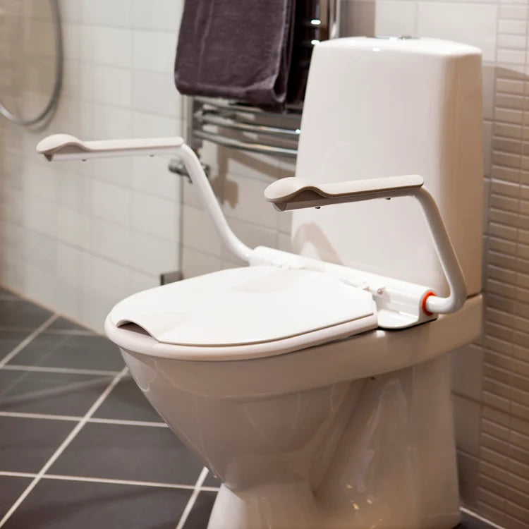 Toiletsæde med armlæn